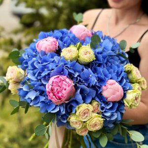 Stunning floral arrangement: Hydrangeas, Peonies, Spray Roses, Eucalyptus