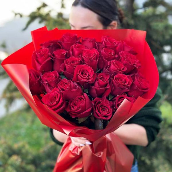 "Passion in Petals" bouquet showcases 25 deep red roses, symbolizing love and passion.