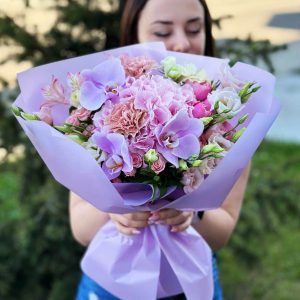 A close-up view of the "Silva Pink Splendor" bouquet, showcasing its stunning Silva Pink roses and their delicate pink petals in full bloom.