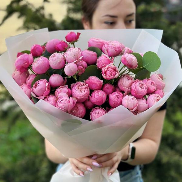 A graceful bouquet featuring Silva Pink roses and lush greenery, exuding elegance and charm. Ideal for special occasions and expressions of love.