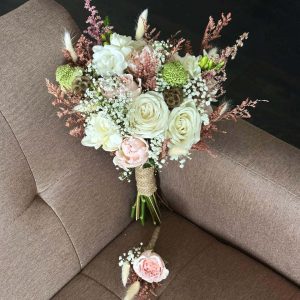 A breathtaking bridal bouquet featuring pure white blooms, perfect for adding elegance to your special day.