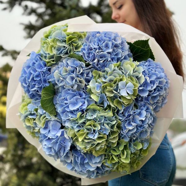 Bouquet featuring beautiful blue hydrangeas.