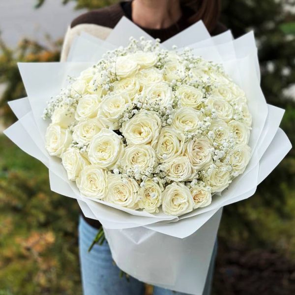 he 'White Lace' bouquet featuring 50 white roses and delicate gypsophila—a symbol of timeless elegance and pure love.