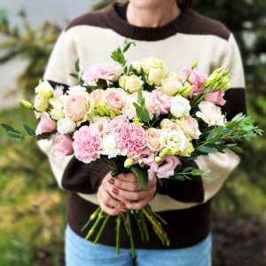 The 'Heart Filled with Flowers' bouquet featuring spray roses, dianthus, lisianthus, and eucalyptus—a symbol of deep affection and lasting beauty.