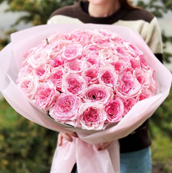 The 'Pink Empire of Blossoms' bouquet featuring 50 pink roses—a symbol of grace and admiration.