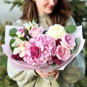 A stunning bouquet featuring bluebells, lavender roses, white lilies, and baby's breath. Perfect for expressing admiration or adding tranquility and elegance to any space.