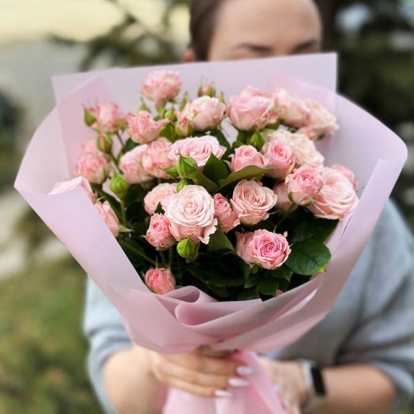 A captivating bouquet named "Bushy Spray Roses Rhapsody," featuring a lush arrangement of spray roses in various shades. Perfect for expressing appreciation and admiration.