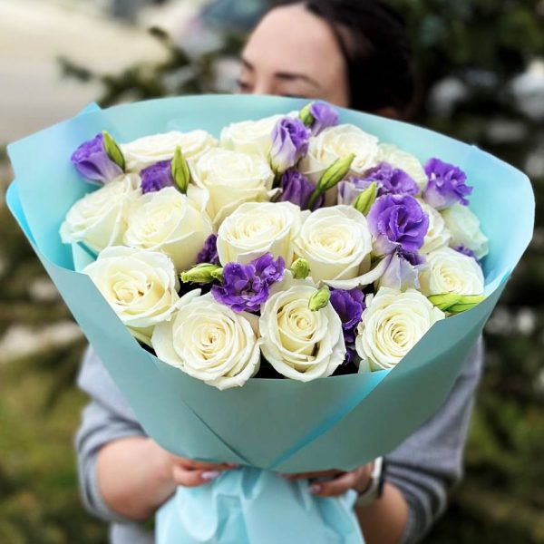 An enchanting bouquet named "Rose and Eustoma Enchantment," featuring a harmonious blend of roses and eustoma. Ideal for expressing affection and admiration.