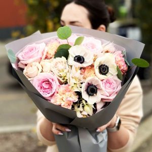 A captivating bouquet featuring hydrangeas, roses, and dianthus, combining classic and delicate beauty in perfect harmony.