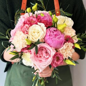 A breathtaking bouquet with roses, dianthus, lisianthus, and eucalyptus, radiating harmony and elegance for your special moments.