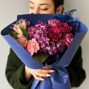 A breathtaking arrangement of hydrangeas, roses, dianthus, astromerias, and astilbes, forming an elegant garden symphony for those who appreciate the finer things in life. Ideal for special occasions and celebrations.