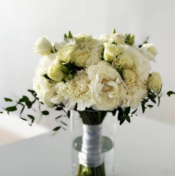 Image of the "Chic Bridal Blooms" wedding bouquet, featuring roses, peonies, and calla lilies, symbolizing love and purity for the perfect wedding day.