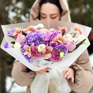 Image of the "Charming Floral Medley" bouquet, showcasing a medley of chrysanthemums, gypsophila, dianthus, spray roses, and astromerias, highlighting its enchanting appeal and fragrant dianthus blossoms.