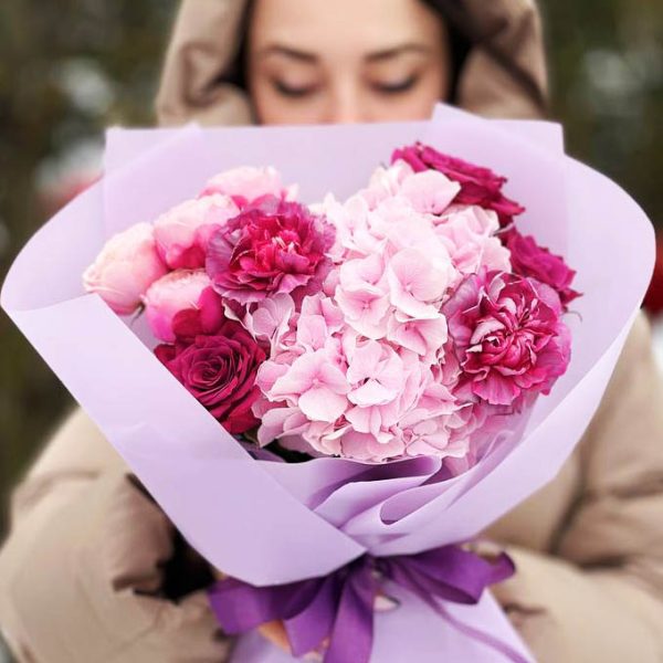 Image of the "Rose and Hydrangea Harmony" bouquet featuring a beautiful blend of roses, hydrangeas, and dianthus, ideal for expressing love, appreciation, and celebrating special moments with elegance and grace.