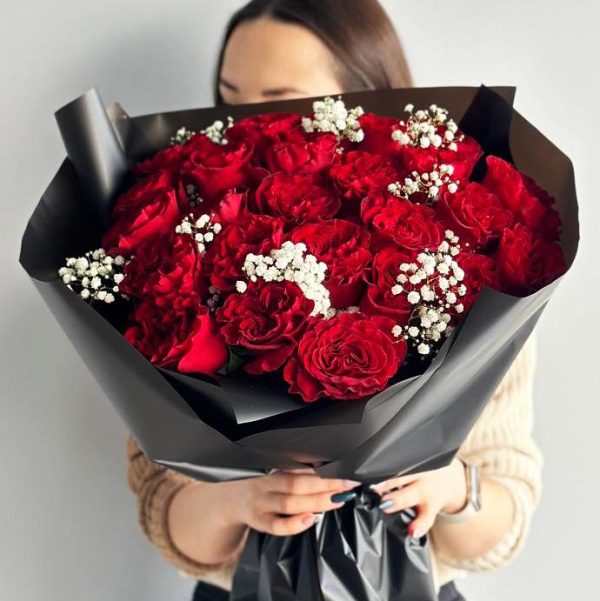 Image of the "Elegant Rose Whispers" bouquet, showcasing a beautiful combination of red and white roses with delicate gypsophila, symbolizing love and purity.