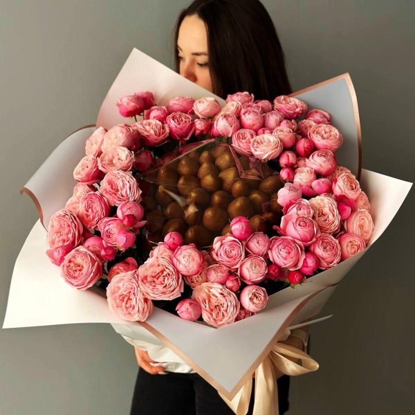 Image of the "Sweet Blooms with Spray Roses" bouquet, featuring a lovely combination of spray roses in various colors and an assortment of sweet treats for a charming and delightful surprise.