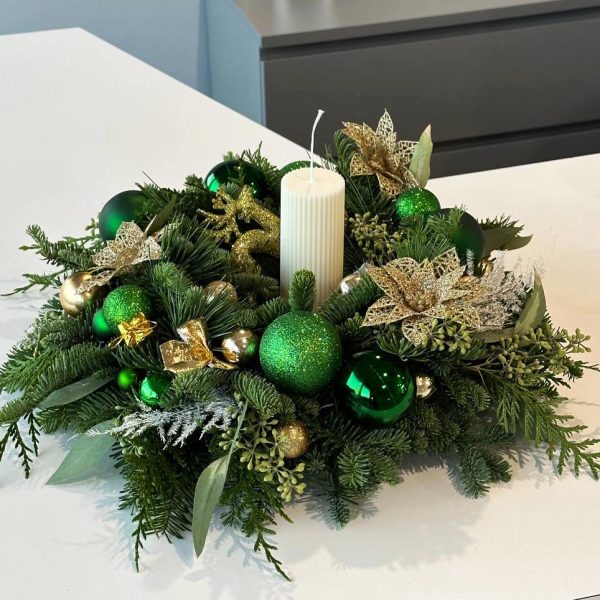 Evergreen Glow: Table centerpiece with a charming Christmas tree-shaped candle, creating a warm and inviting holiday atmosphere for your festive dining experience.