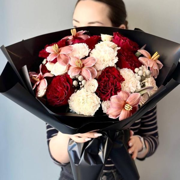 Spring Gentleness: Bouquet with roses, dianthus, tulips, spray roses, and brunia, creating an impression of spring freshness and elegance.