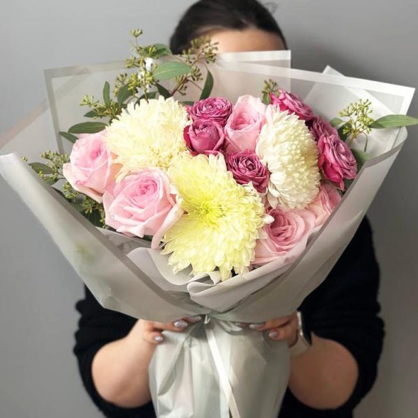 Ethereal Blooms: A captivating bouquet showcasing chrysanthemums, roses, spray roses, and eucalyptus, creating an ethereal and fragrant floral arrangement.