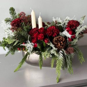 Forest Ensemble: Woodland decor with cedar, pine, chrysanthemums, spray roses, asparagus, skimmia, and pinecones, creating a natural and elegant ensemble.