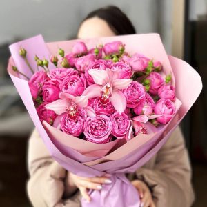 Petal Harmony Bouquet: An exquisite arrangement showcasing peony-like spray roses and sophisticated orchids, creating a harmonious blend of lush petals and timeless grace, perfect for special moments or adding luxury to your space.