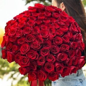 Regal Romance Bouquet: A majestic arrangement featuring 90 roses, designed for making a statement and expressing deep love and admiration on special occasions
