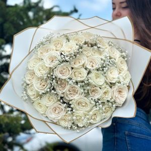 Gossamer Rose Harmony Bouquet: A stunning arrangement featuring roses and Gypsophila, capturing the essence of delicate beauty and perfect for expressing love or appreciation.