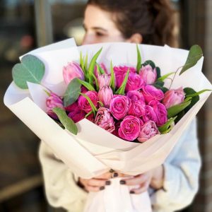 Valentine's Spring Symphony: A vibrant bouquet featuring tulips, spray roses, and eucalyptus, aptly named for its lively and harmonious essence. Perfect for celebrating love and the rejuvenating spirit of spring.