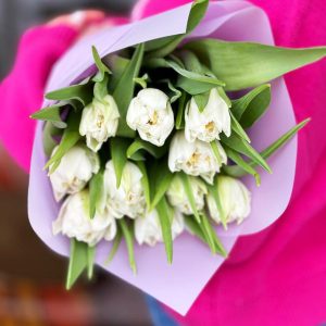 Sunbeam Tulips: A vibrant bouquet capturing the warmth and brightness of a sunbeam, perfect for spreading joy and positivity.