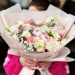 Enchanting Spring Blossoms Bouquet showcasing peonies, spray roses, alliums, coronations, freesia, roses, lisianthus, and gypsophila for a luxurious and captivating display.