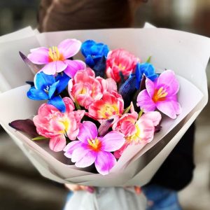 Spring Tulip Delight Bouquet showcasing a variety of vibrant tulips in different shades for a colorful and cheerful display.