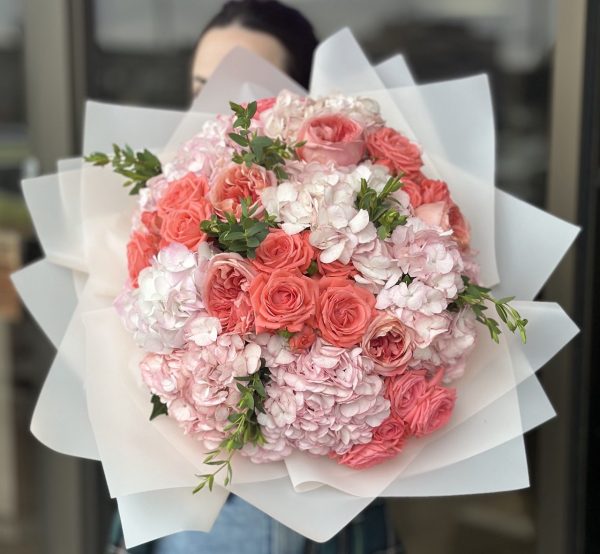 Evoke the magic of Spring with 'Spring Nights' bouquets. Delight in enchanting floral arrangements inspired by the beauty of starlit evenings. Illuminate any occasion with our captivating blend of blooms and fragrances. Order now to add a touch of Springtime charm to your celebrations.