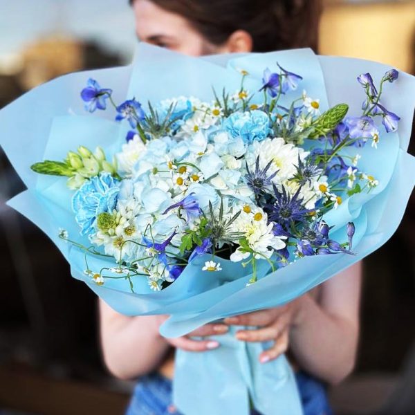 Charming Garden Medley Bouquet showcasing lush hydrangeas, vibrant chrysanthemums, delicate dianthuses, unique eryngiums, ornithogalums, and mini chamomiles for a captivating and enchanting display.