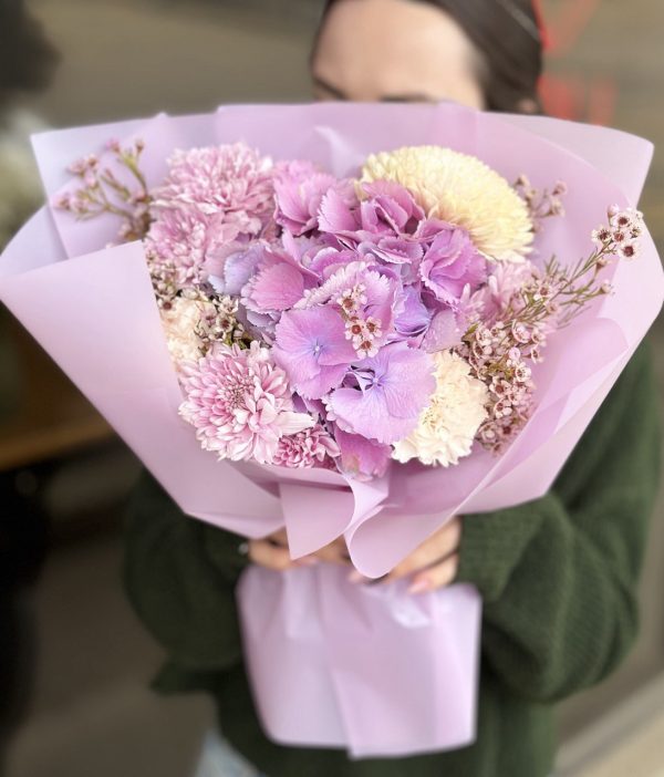 Discover the charm of our Delicate Dewdrops flower bouquet. Featuring fresh, vibrant blooms, it's the perfect gift for any occasion. Order now for fast, reliable delivery!