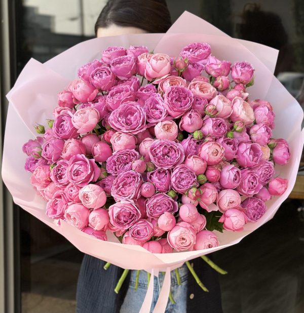 Colorful bouquet featuring a vibrant mix of blooms in the 'Bright Silva Symphony' arrangement, adding a burst of cheer and elegance.