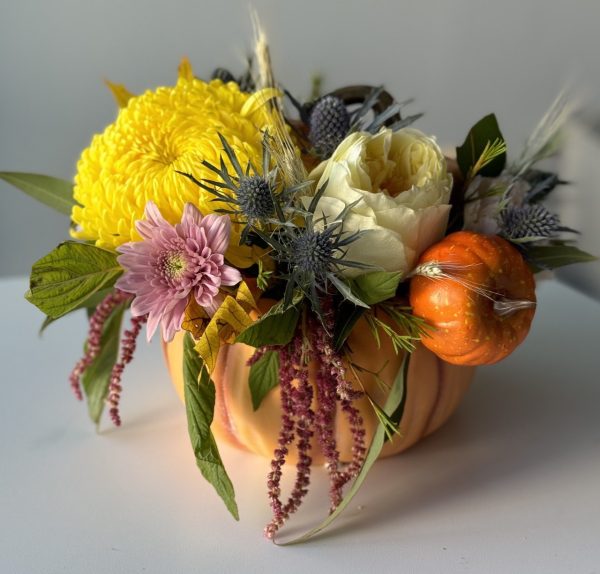 Autumn flower arrangement featuring rich seasonal blooms in warm colors, perfect for Thanksgiving decor.