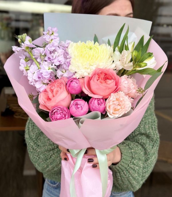 A charming bouquet titled "Tender Touches," featuring soft pastel roses, delicate peony roses, and sweet chrysanthemums.