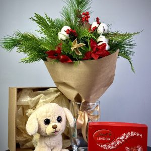 "Christmas gift set with a cotton ilex arrangement, vase, a festive toy, and candies, perfect for holiday gifting."