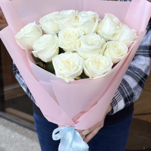 "Be Mine Bouquet" of 12 white roses, elegantly arranged to express love and affection.