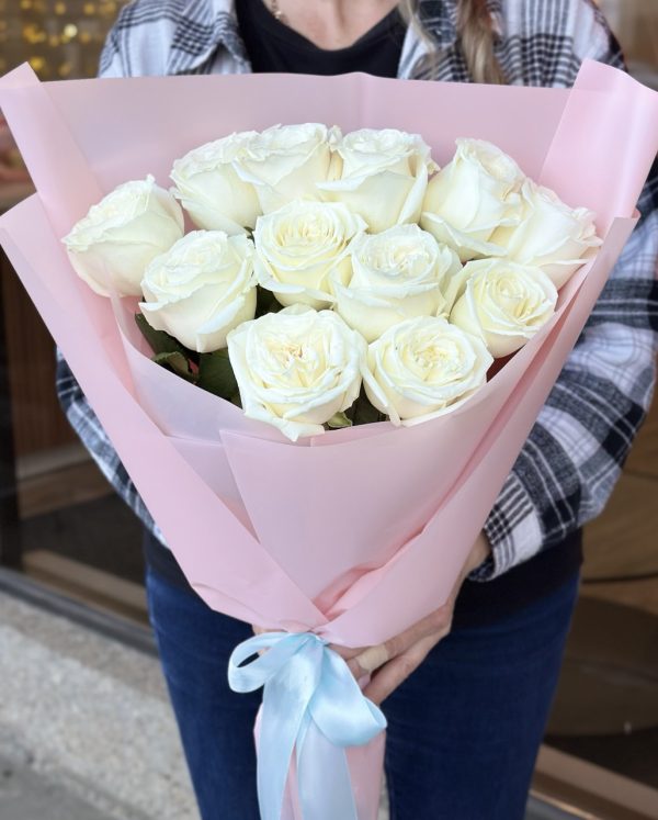 "Be Mine Bouquet" of 12 white roses, elegantly arranged to express love and affection.