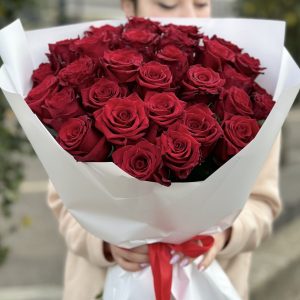 Cupid’s Touch bouquet featuring 30 red roses, perfect for expressing love and romance.