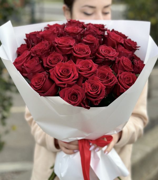 Cupid’s Touch bouquet featuring 30 red roses, perfect for expressing love and romance.