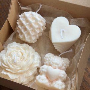 "The Classic of Coziness" Candle Box, a set of soothing candles designed to bring warmth and relaxation to any room.