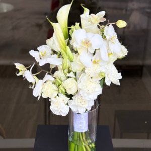 Bridal bouquet with orchids, lilies, spray roses, and carnations